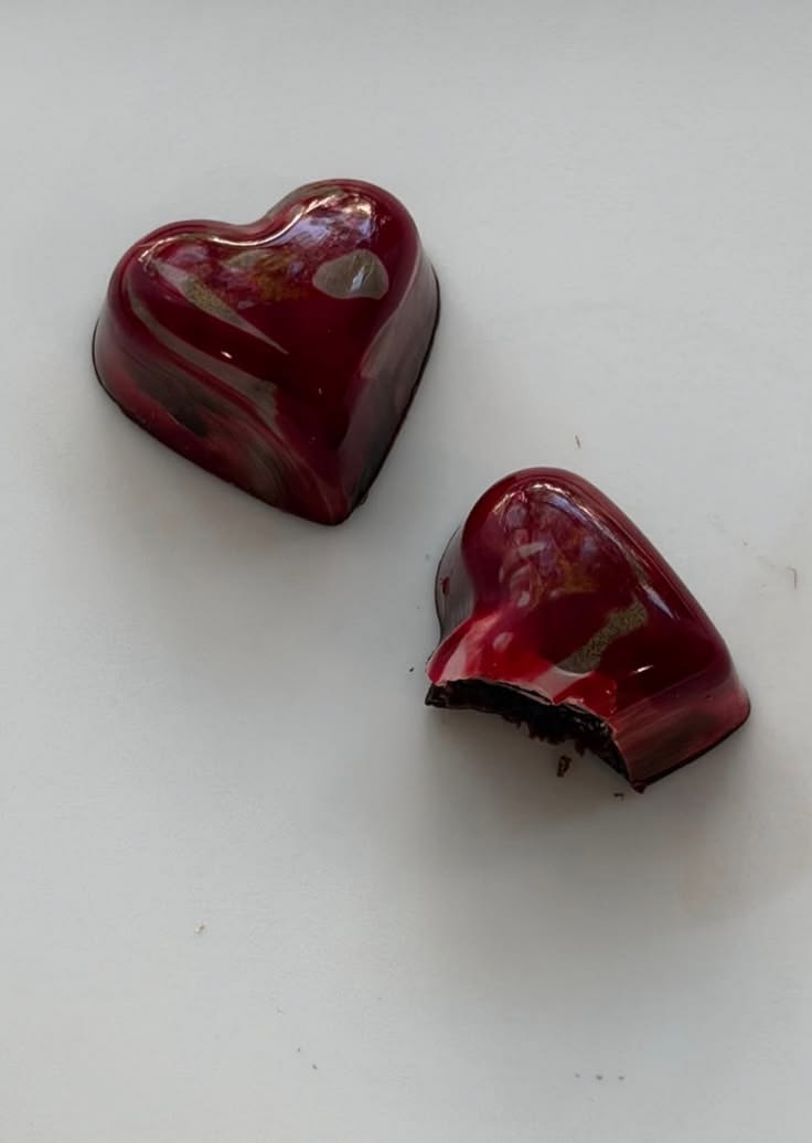 Glossy ruby-red heart bonbons